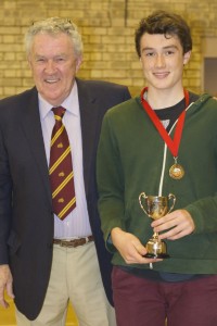 Anthony Anderson (Kingston Wheelers) receives the Boys Cup for the U16 boys points, the Youth Pursuit Championship Cup and the Youth Sprint Championship Cup for 2013